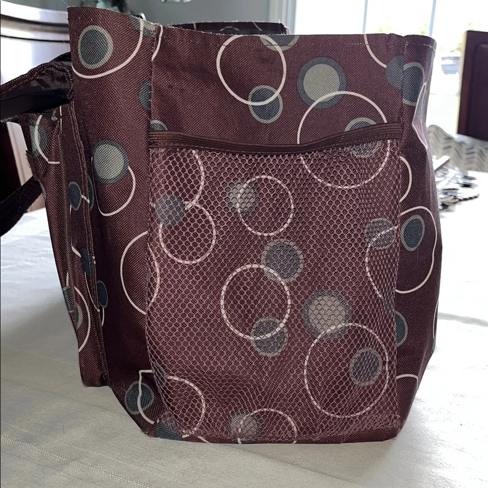 All purpose Brown Polka Dot Vinyl Tote Bag Open at top with side pockets.